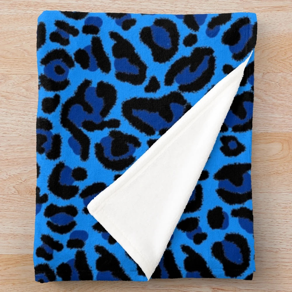 Blue leopard print plush blanket with a soft, cozy texture