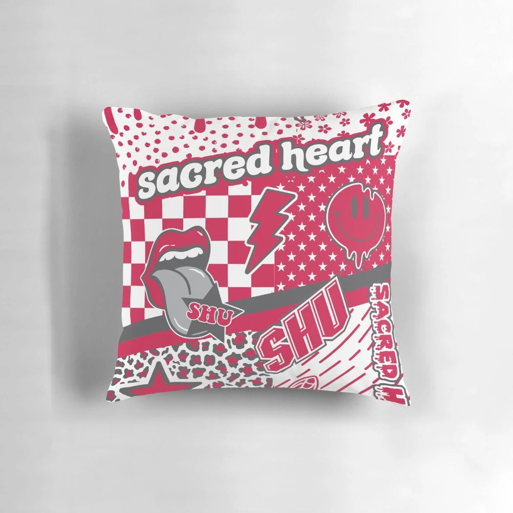 A vibrant sacred heart throw pillow with butterfly, floral, and animal print accents.