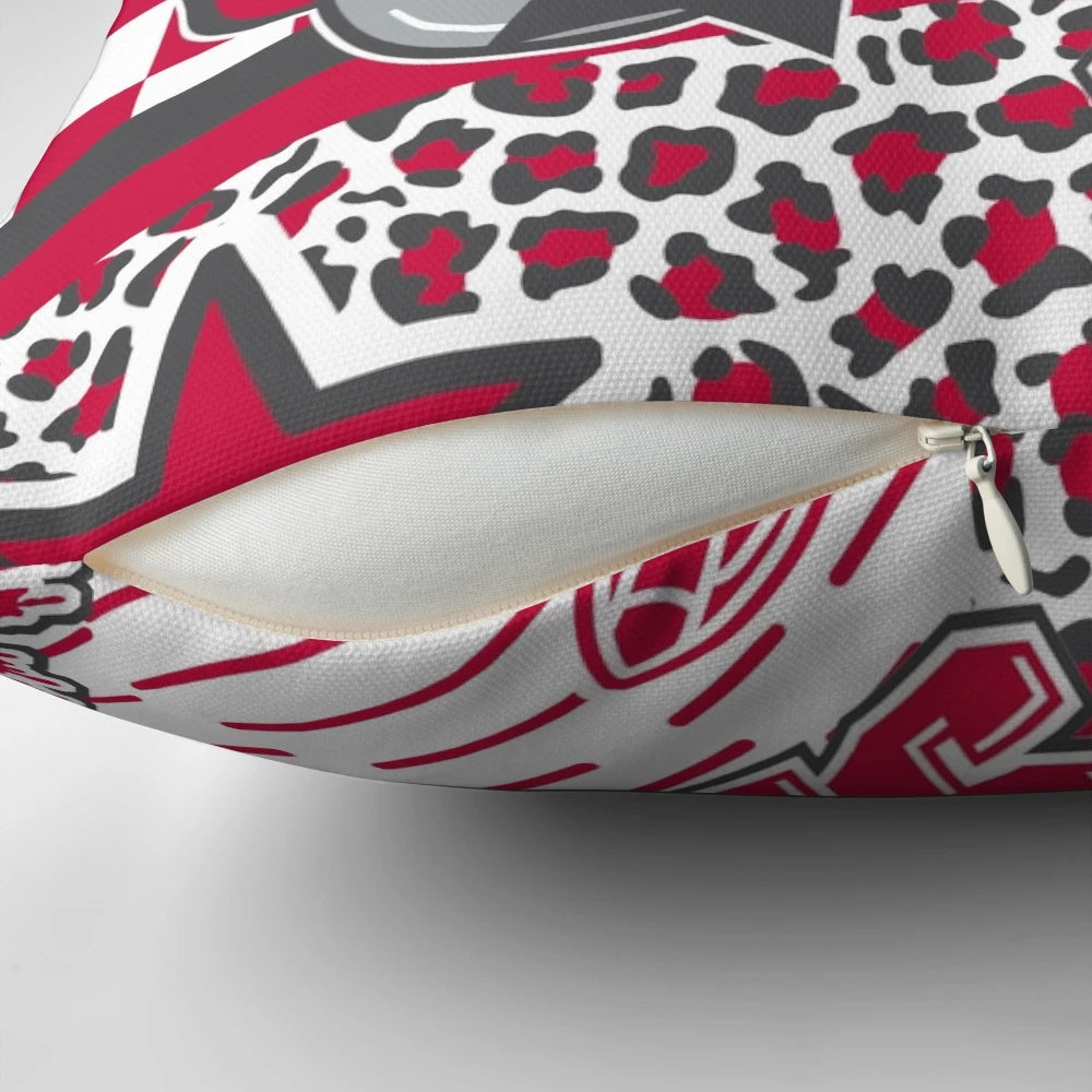A vibrant sacred heart throw pillow with butterfly, floral, and animal print accents.