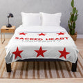 Colorful tie-dye plush blanket with a sacred heart design