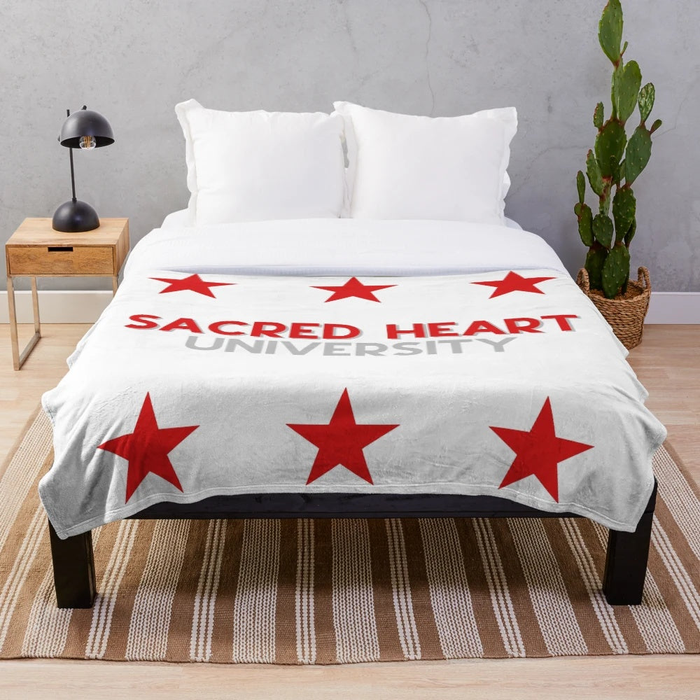 Colorful tie-dye plush blanket with a sacred heart design
