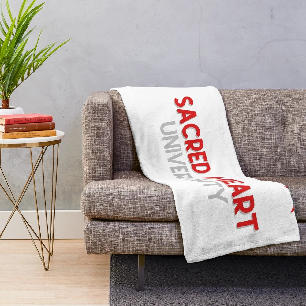 Colorful tie-dye plush blanket with a sacred heart design