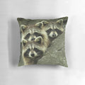 Tres Banditos Pillow featuring a playful raccoon design