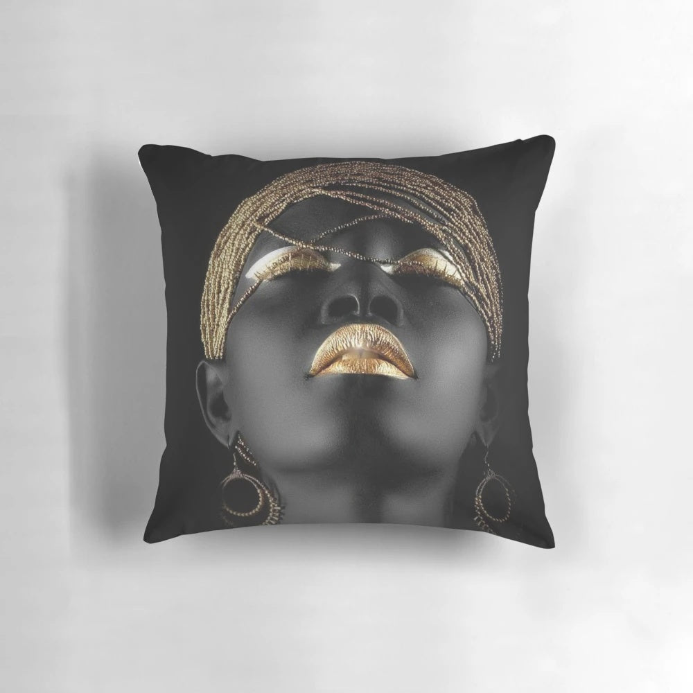 Decorative pillow featuring an abstract portrait of a tribal African woman with jewelry and gold accents.