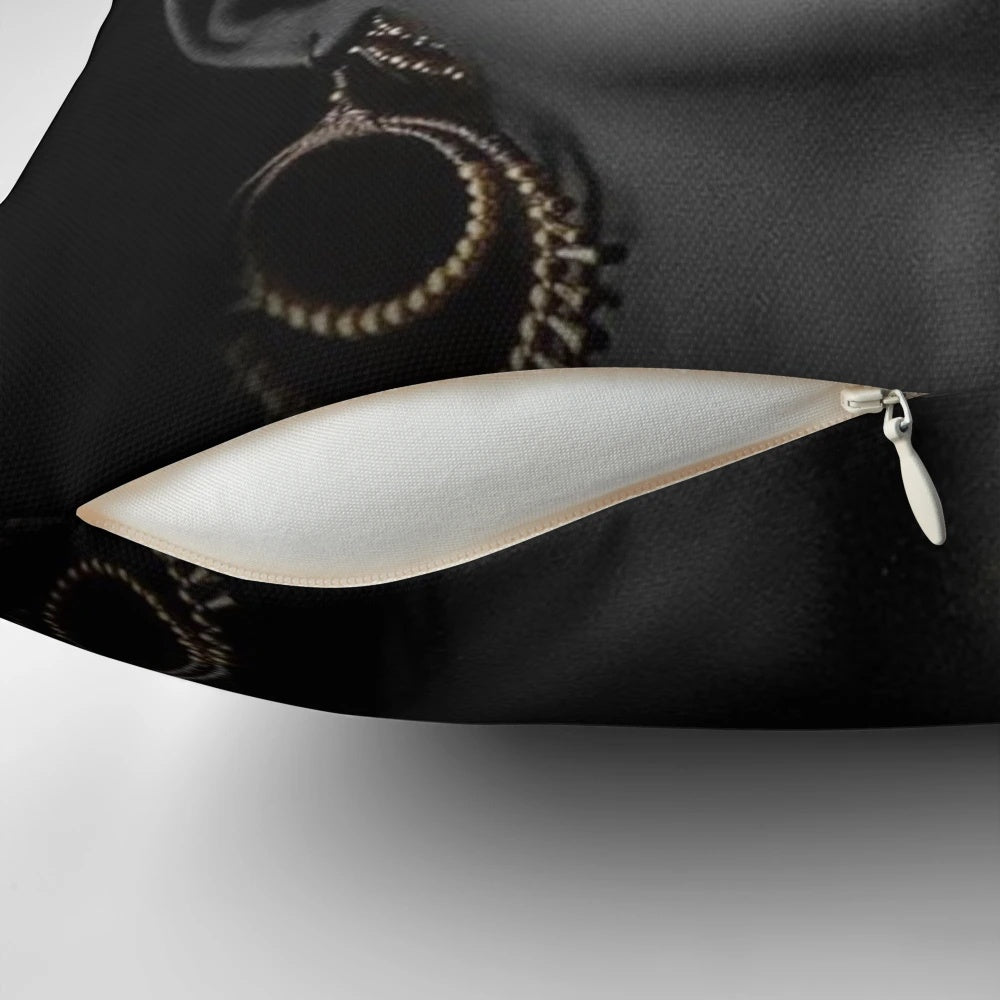 Decorative pillow featuring an abstract portrait of a tribal African woman with jewelry and gold accents.