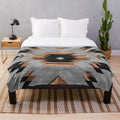 Tribal Aztec pattern plush blanket with wood and concrete design