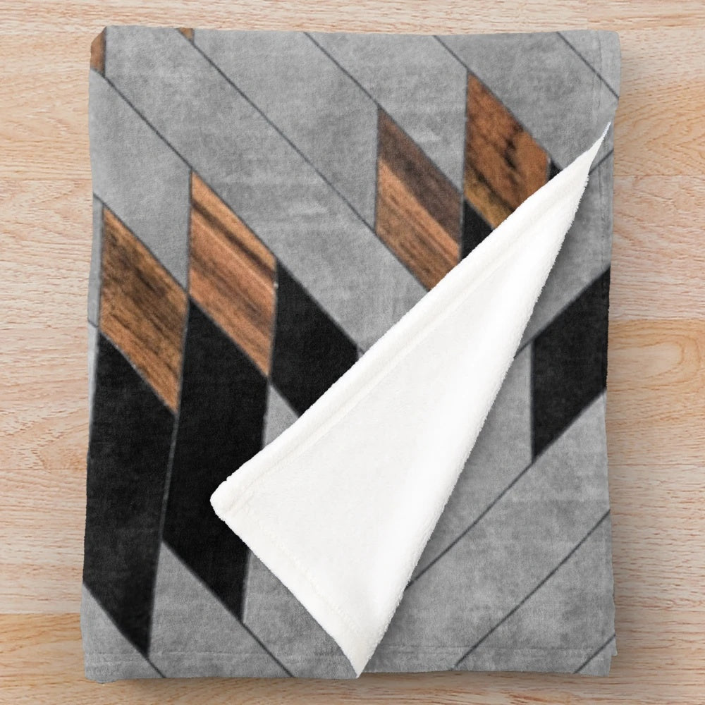 Tribal Aztec pattern plush blanket with wood and concrete design