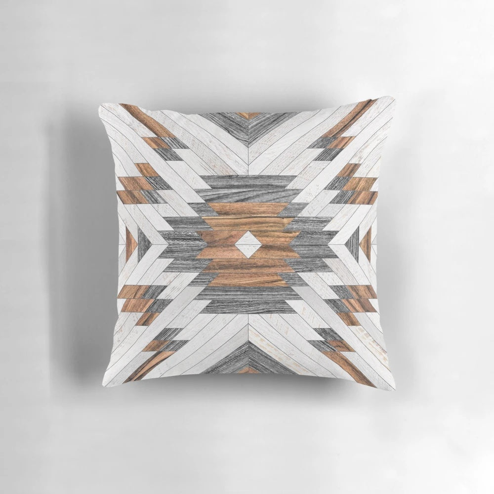 Tribal Aztec wood throw pillow with a modern, graphic design in a boho, bohemian style.