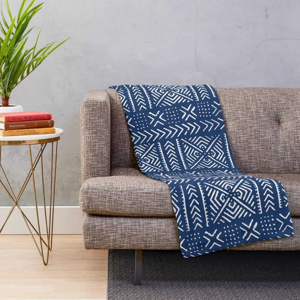 Tribal-inspired dark blue plush blanket featuring line mud cloth design