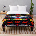 Tribal-inspired plush blanket with Chicago sports team colors and tribal textures