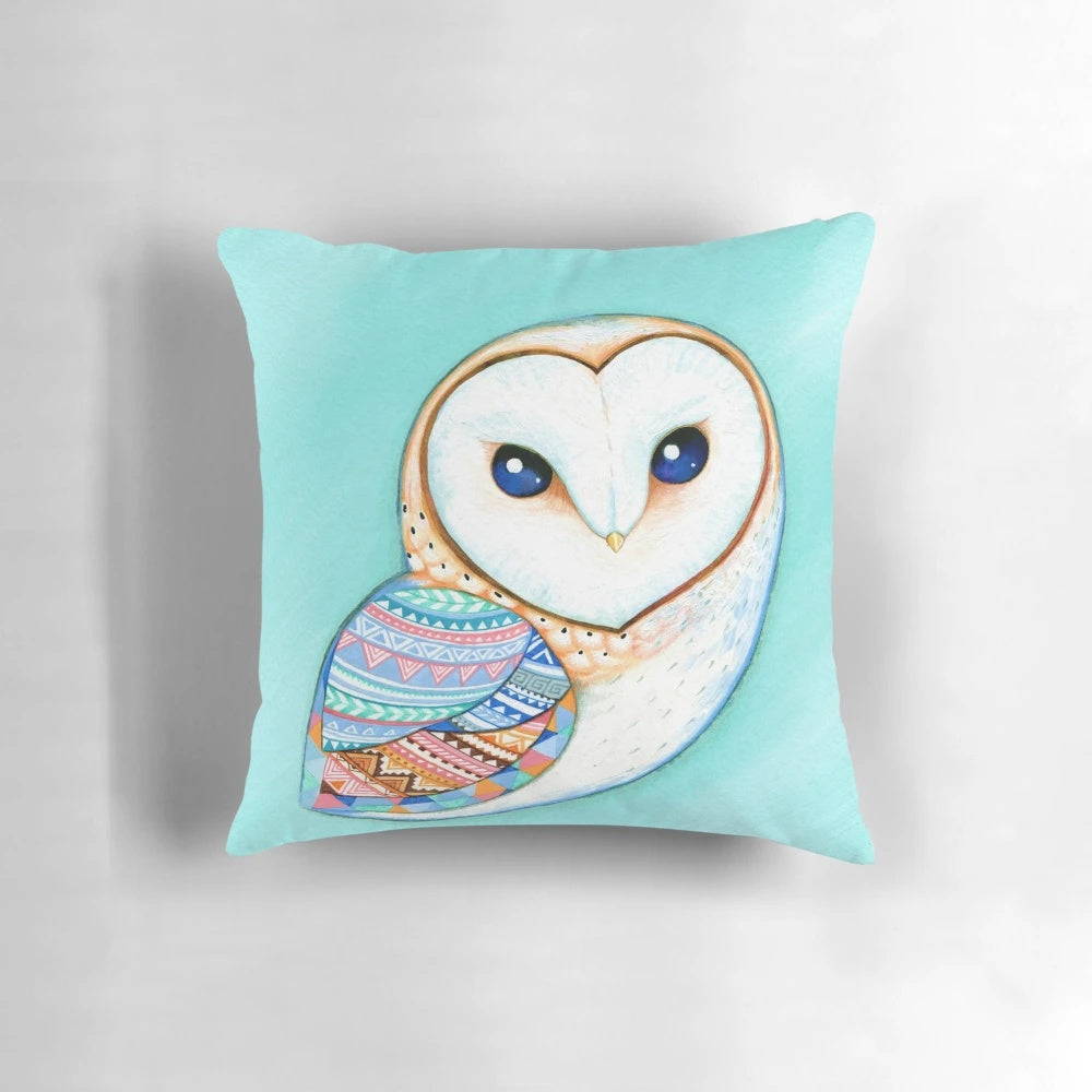 Tribal pattern barn owl illustration on a decorative pillow