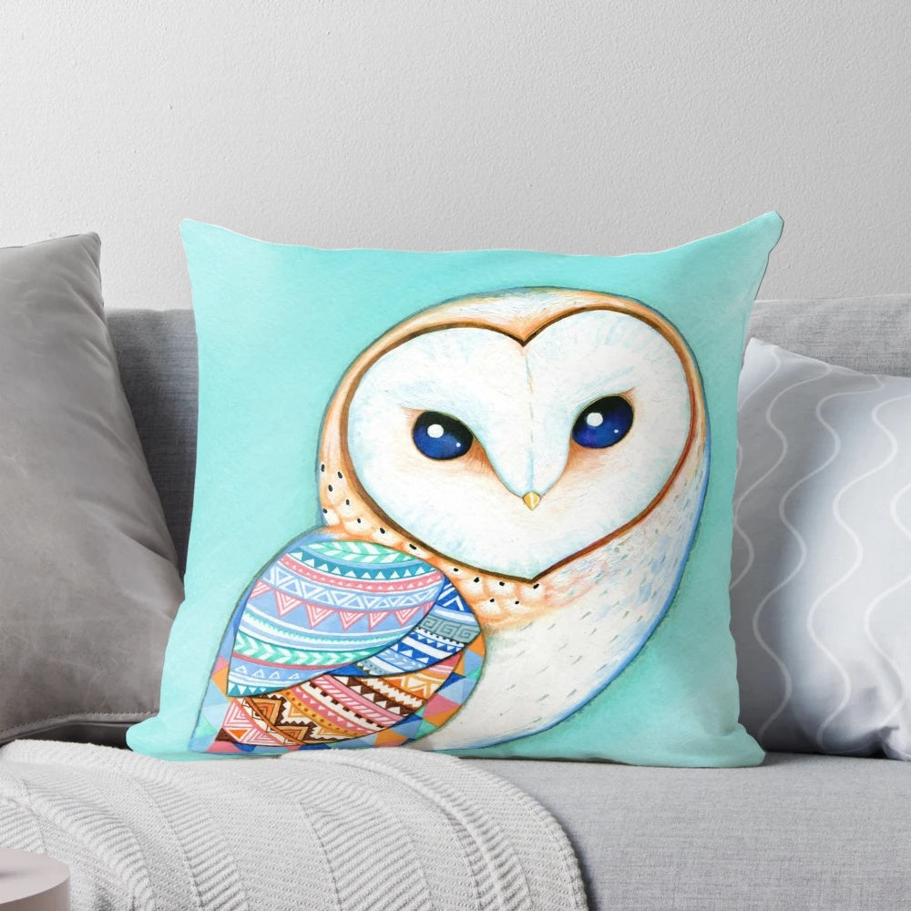 Tribal pattern barn owl illustration on a decorative pillow