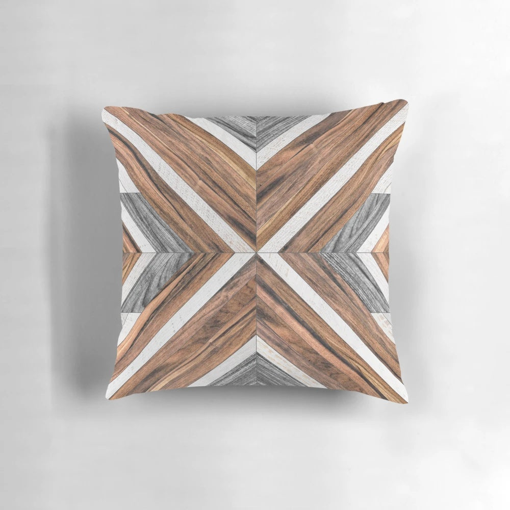 Tribal pattern wood pillow with a modern graphic design, perfect for boho-style decor.