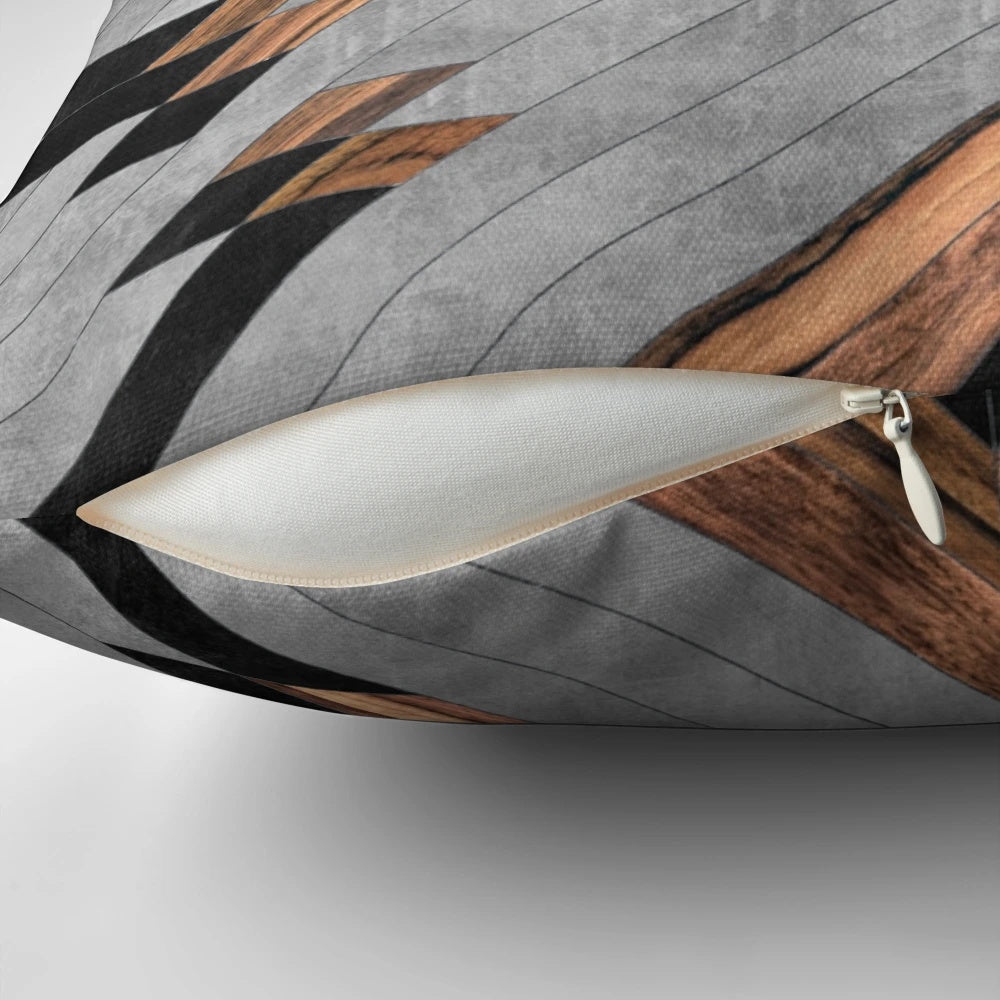 Tribal-inspired geometric pattern pillow with a mix of concrete and wood elements