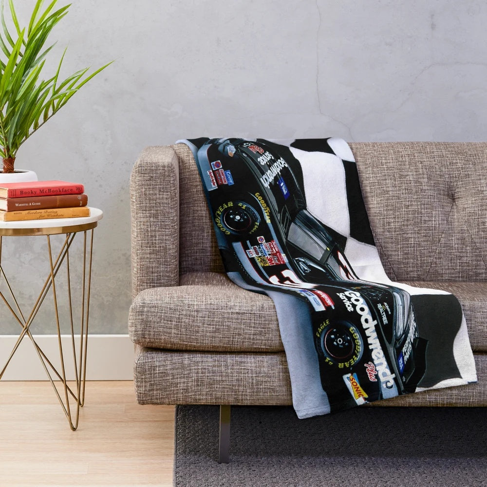 Plush black blanket featuring tribute design to NASCAR driver Dale Earnhardt