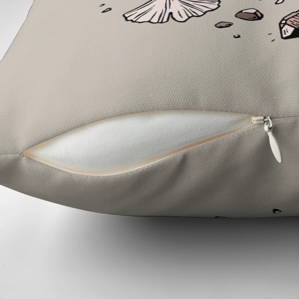 Decorative Triceratops dinosaur skull fossil art pillow with rose quartz mineral accent.