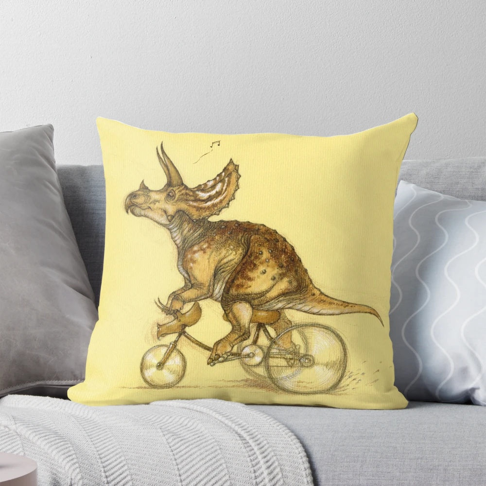 Image of a colorful, illustrated Triceratops dinosaur printed on a soft, plush pillow.