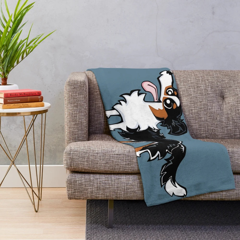 Tricolor border collie plush blanket with blue background