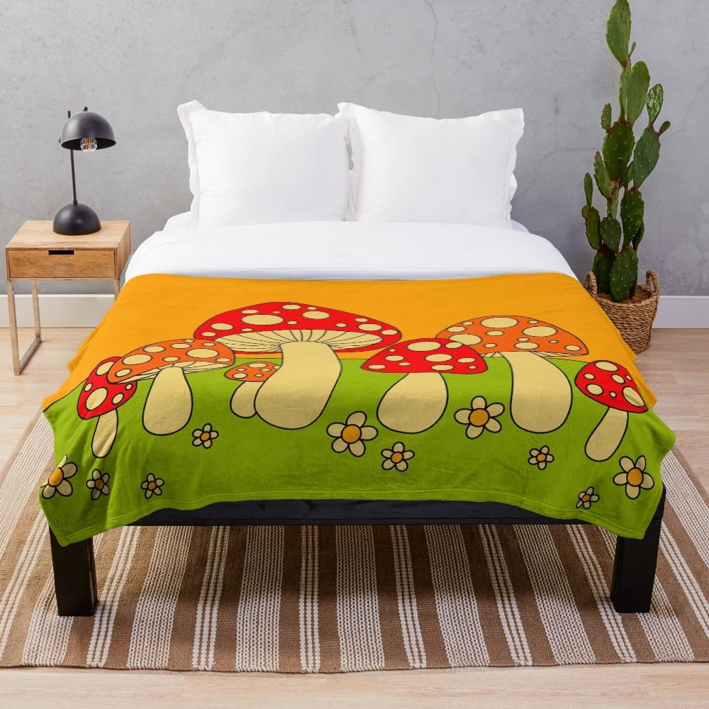 Soft, cozy plush blanket featuring a vibrant mushroom design in psychedelic colors