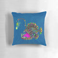 Colorful, hand-drawn electric angler fish on a pillow, evoking a trippy, underwater scene