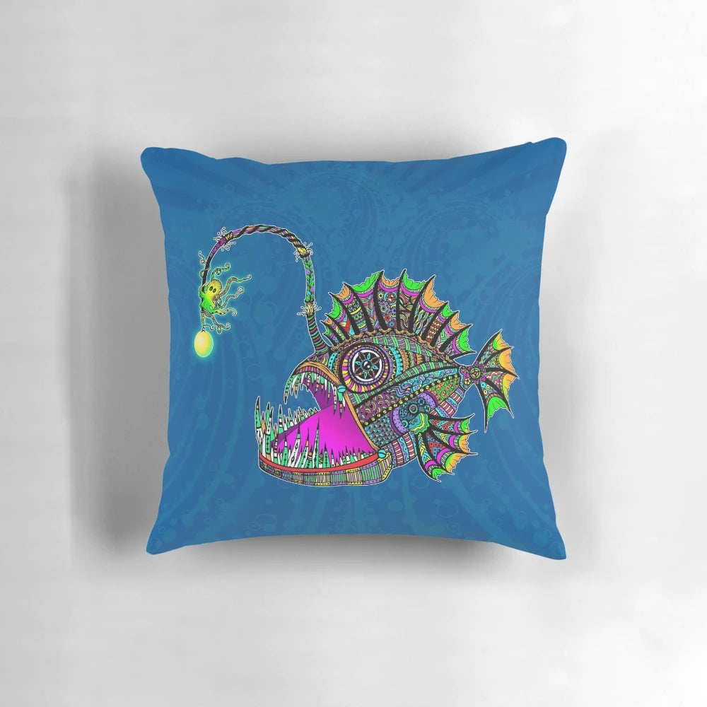 Colorful, hand-drawn electric angler fish on a pillow, evoking a trippy, underwater scene