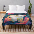 Plush blanket featuring a colorful floral guppy fish design