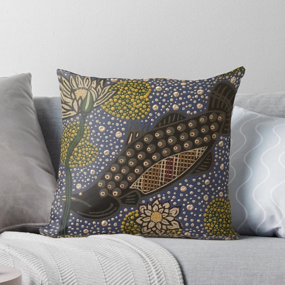 Decorative pillow featuring a vibrant image of a barramundi fish swimming among water lillies, creating a nature-inspired, coastal-themed accent for the home.