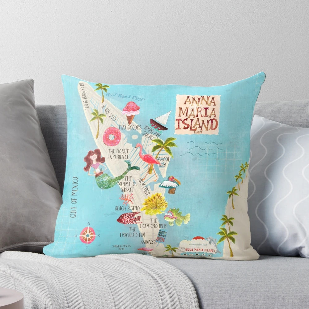 Tropical beach-themed pillow featuring a custom island map design in shades of turquoise, pink, and orange.