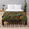 Tropical botanical night garden plush blanket with lush green jungle pattern