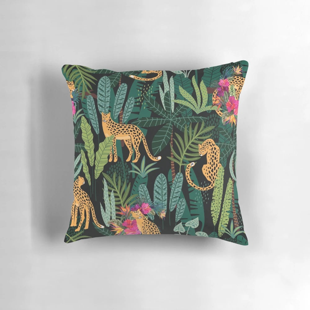 Tropical cheetah print decorative pillow with palm leaves, flowers, and vibrant colors
