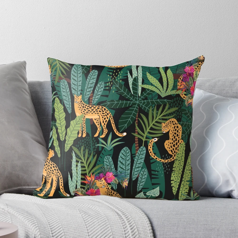 Tropical cheetah print decorative pillow with palm leaves, flowers, and vibrant colors