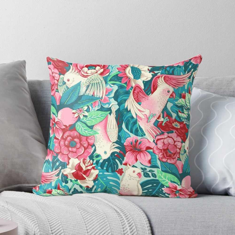 Vibrant tapestry-style pillow depicting a cockatoo and parrot in a lush, tropical forest setting