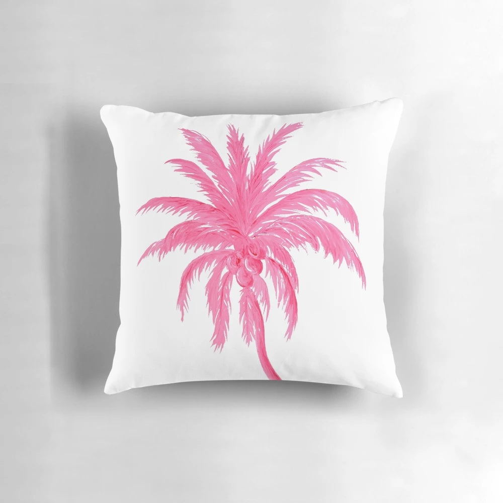 Decorative throw pillow featuring a beautiful coconut palm tree against a pink background