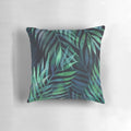 Dark green palm leaves pattern design on a pillow