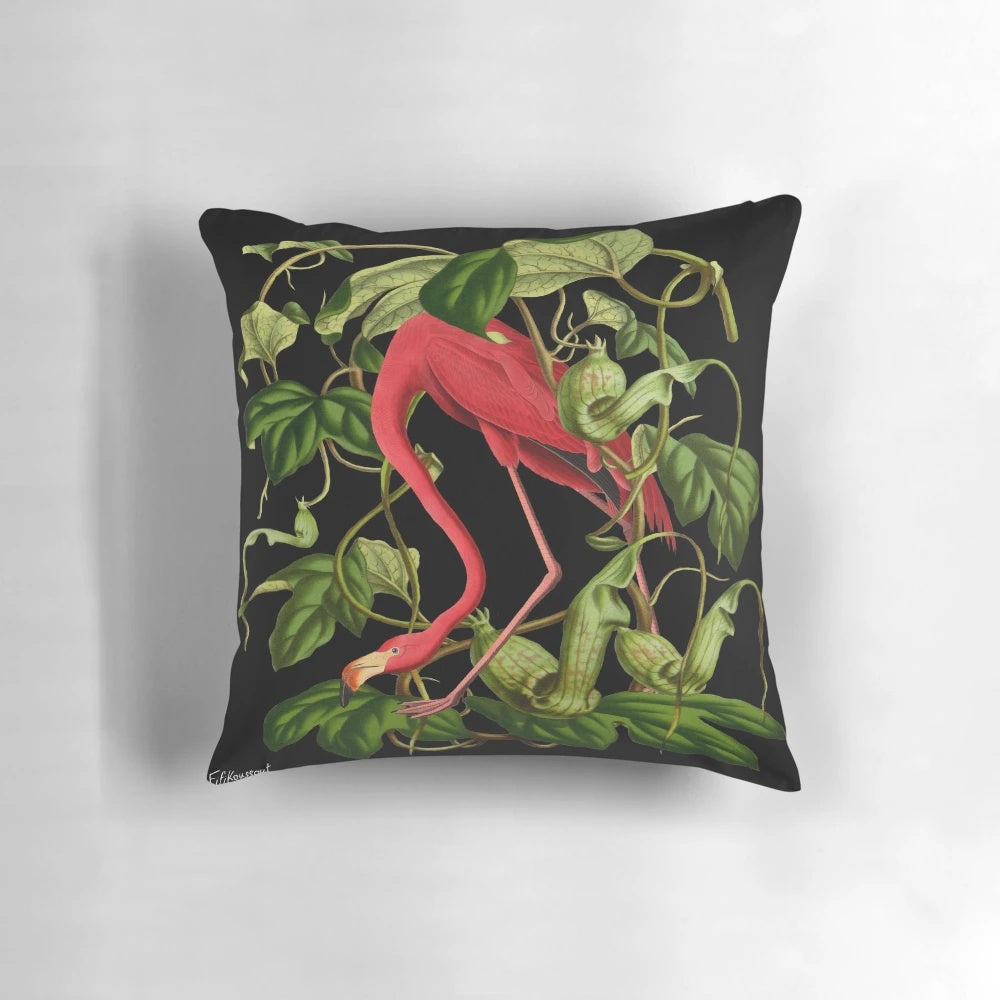 Vibrant pink flamingo pillow with tropical foliage design, perfect for adding a touch of nature-inspired style to your home.