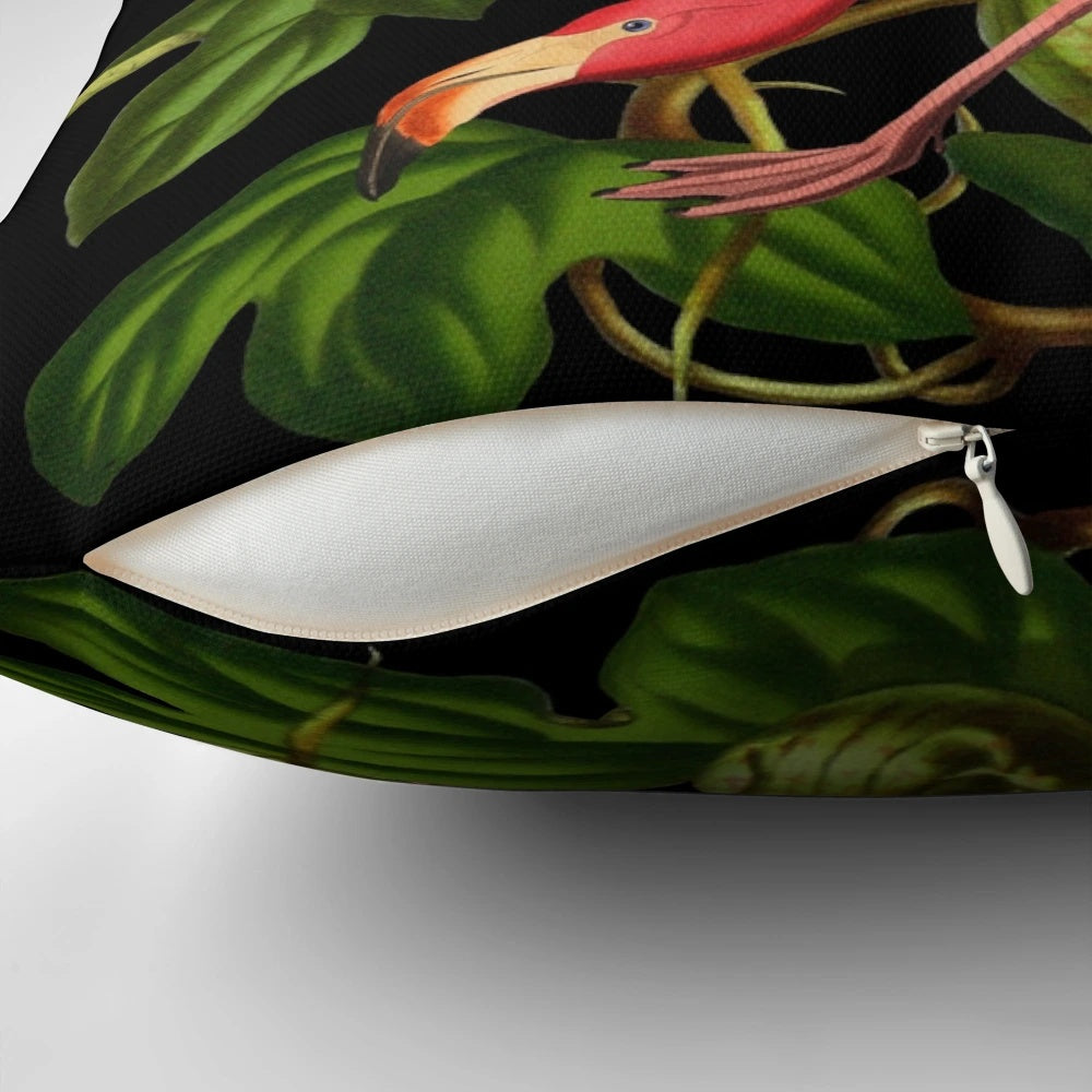 Vibrant pink flamingo pillow with tropical foliage design, perfect for adding a touch of nature-inspired style to your home.