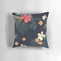 Tropical flowers and botanical foliage pattern on a soft, plush pillow