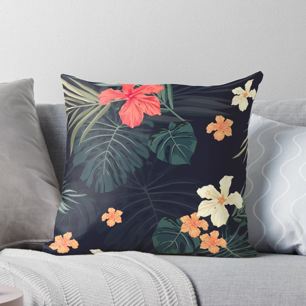 Tropical flowers and botanical foliage pattern on a soft, plush pillow