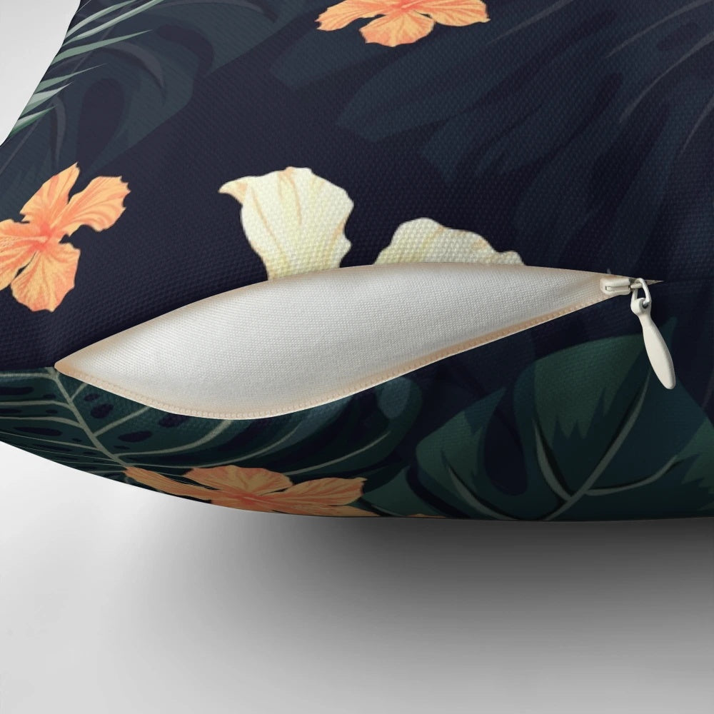 Tropical flowers and botanical foliage pattern on a soft, plush pillow