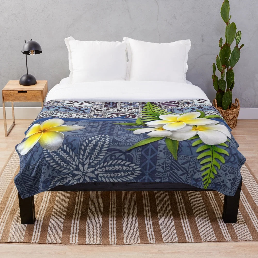 Tropical Hawaiian plush blanket with plumeria flowers and polynesian tribal tapa design