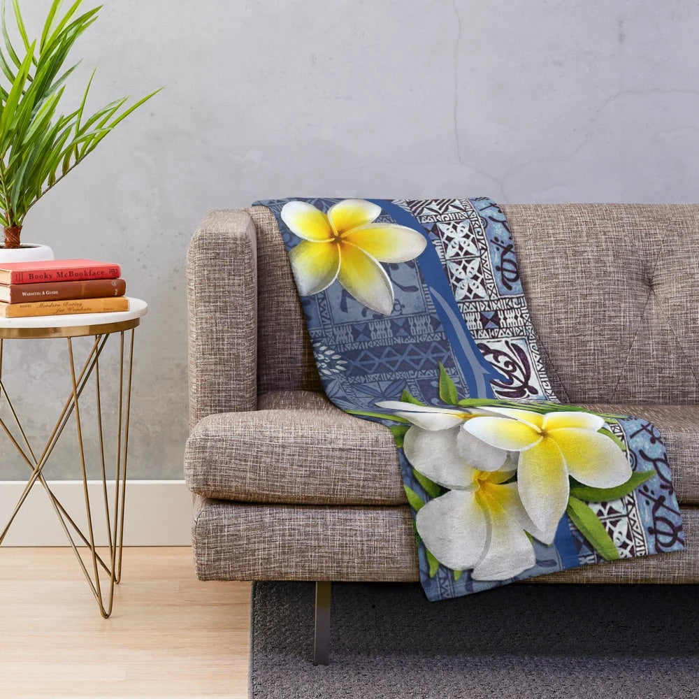 Tropical Hawaiian plush blanket with plumeria flowers and polynesian tribal tapa design