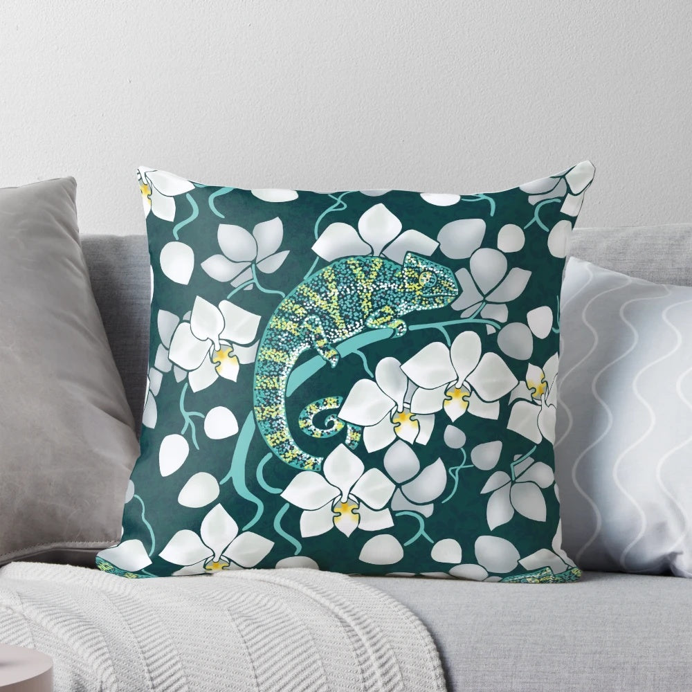 Vibrant tropical floral pillow featuring white orchids and lush greenery