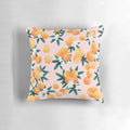 Vibrant orange and green botanical pattern pillow with tropical fruit and floral designs