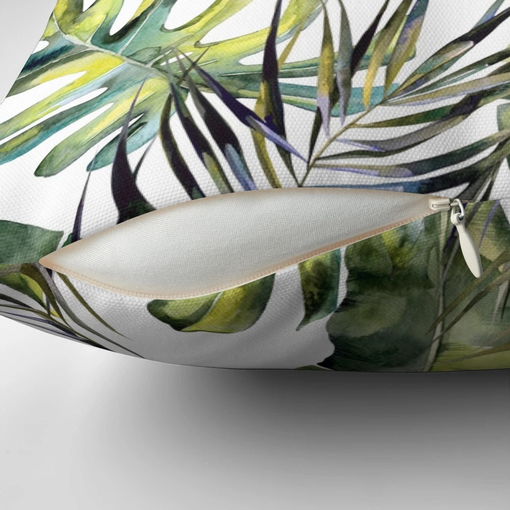 Vibrant tropical garden-inspired botanical pillow with watercolor leaves, bird of paradise, and other lush foliage elements.