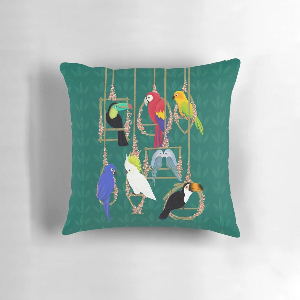 Vibrant tropical-inspired pillow with parrots, toucans, and other colorful birds