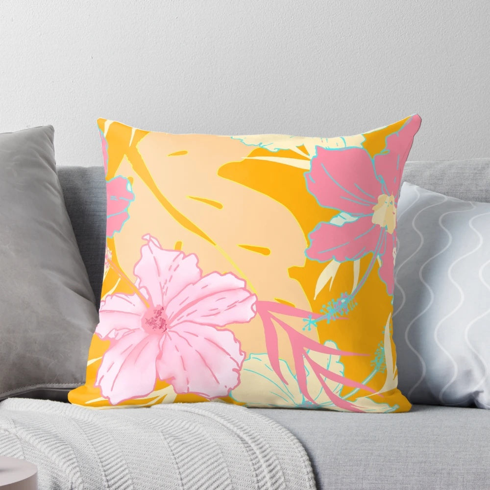 Tropical island-inspired pillow with hibiscus flowers and monstera leaves in a pastel pink and orange watercolor pattern.