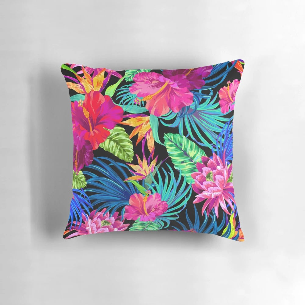 Decorative pillow with a vibrant tropical hibiscus flower pattern in a summer paradise design.