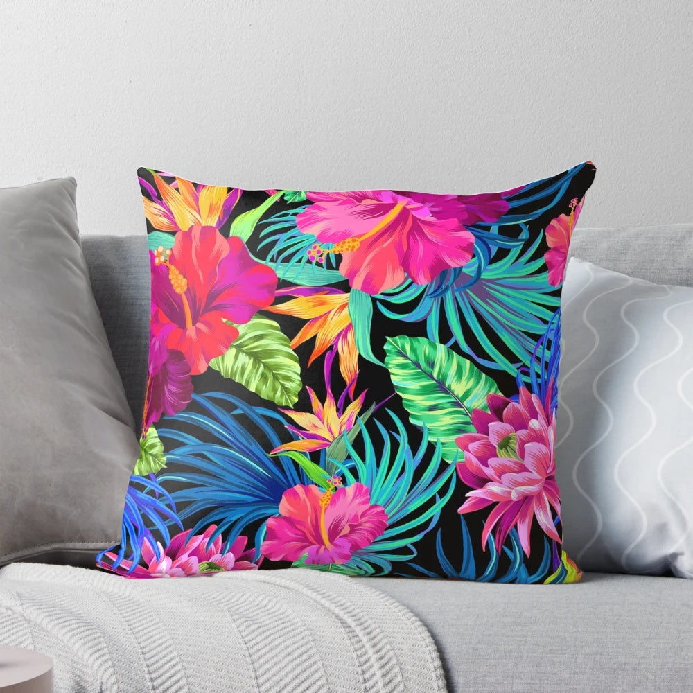 Decorative pillow with a vibrant tropical hibiscus flower pattern in a summer paradise design.