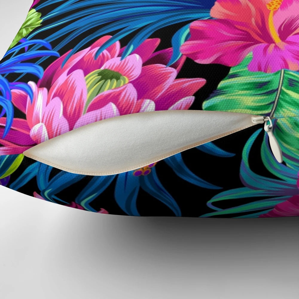 Decorative pillow with a vibrant tropical hibiscus flower pattern in a summer paradise design.