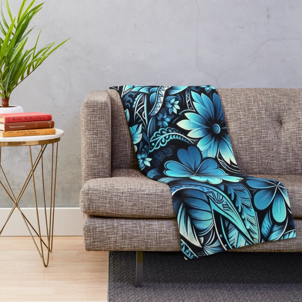 Plush blanket featuring a polynesian-inspired floral and tropical leaf design
